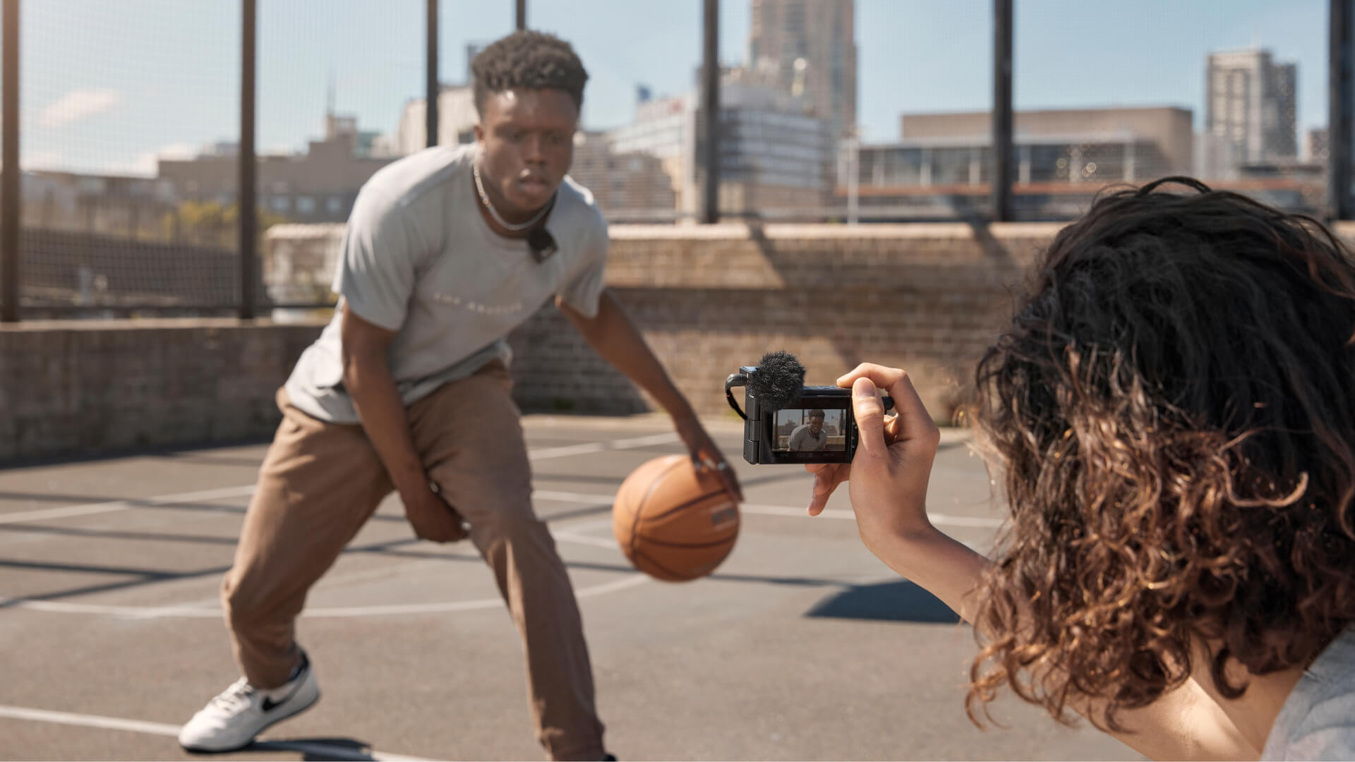 Wireless ME on ground next to basketball player